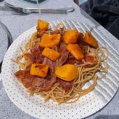 A picture of Parma ham and butternut pasta.