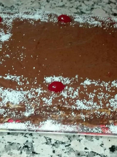 Una foto de Tarta de galletas, chocolate y dulce de leche