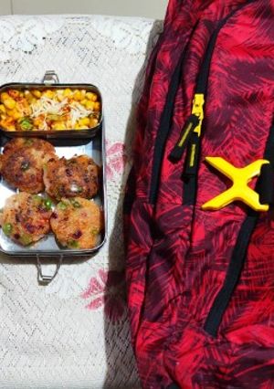 A picture of Veggie paneer tikki with corn chat.