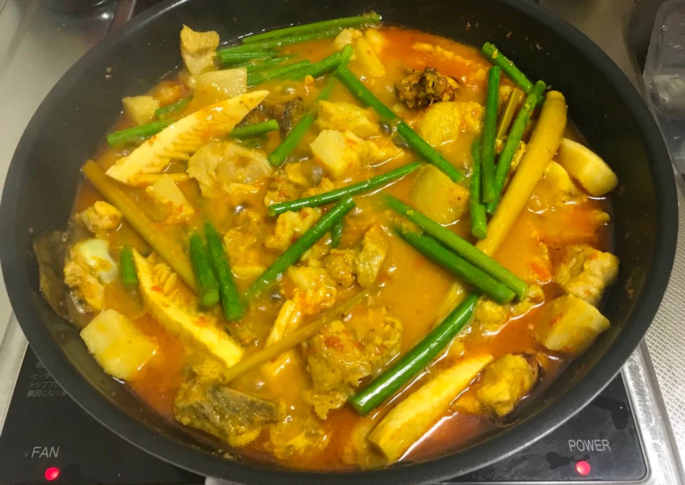 Arsik Babi Pork in yellow curry (Non-Halal)