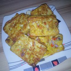 A picture of Bread in egg fry.