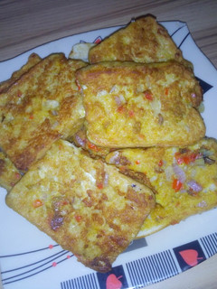 A picture of Bread in egg fry.