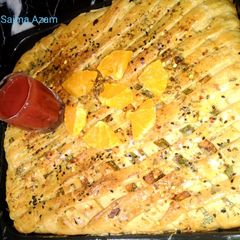 A picture of Orange chicken bread😋اورنج چکن بریڈ😍.