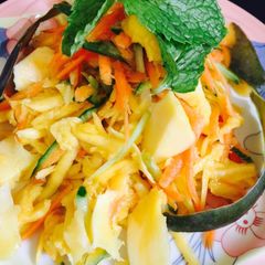 A picture of Raw mango carrot salad.