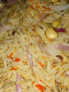 A picture of Jollof rice and beans.