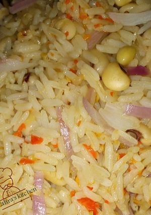 A picture of Jollof rice and beans.