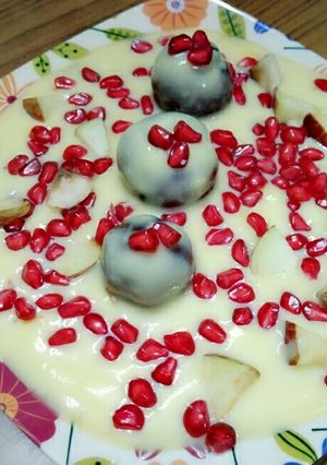 A picture of Fruit chocolate balls custard.