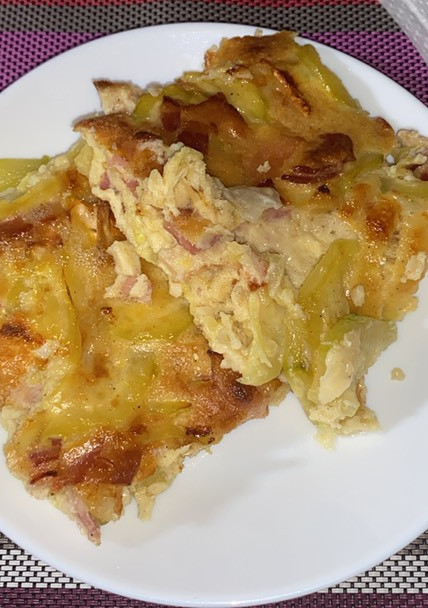 Una foto de Pastel de calabacín, bacon y queso de cabra
