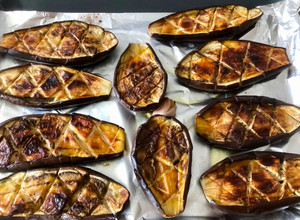 Una foto de Berenjenas asadas