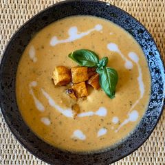 A picture of Butternut squash Thai red curry soup.