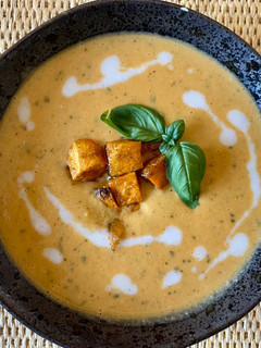A picture of Butternut squash Thai red curry soup.