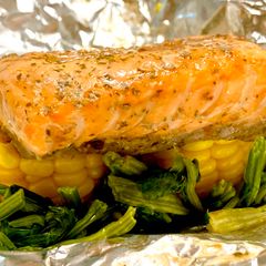 A picture of Foil Wrapped Salmon & Vegetable Grill.