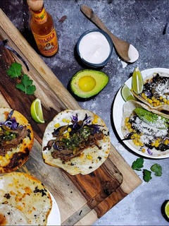 A picture of Slow Cooker Lamb Tacos with Mint Relish and Spicy Aioli.