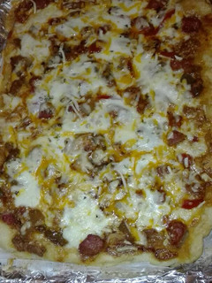 Una foto de Pizza mixta picantita