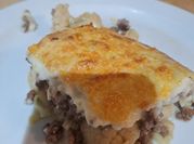 Una foto de brócoli horno con bechamel
