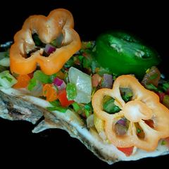A picture of Mike's Angry Drunken Grilled Oysters.