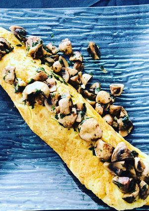 Une photo de Omelette roulée aux champignons
