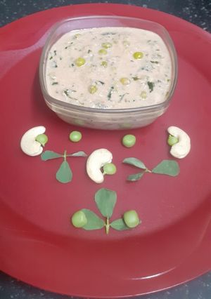 A picture of Methi Matar Malai in White Gravy.