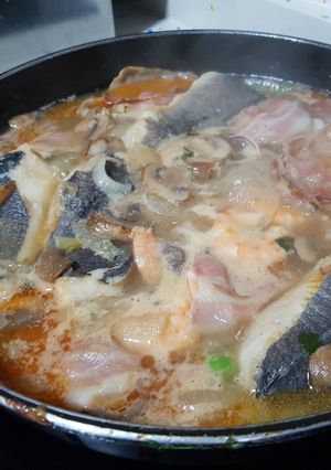 Foto principal de Lomos de merluza con langostinos