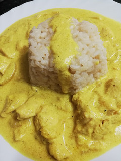 Una foto de Arroz meloso con pollo al curry