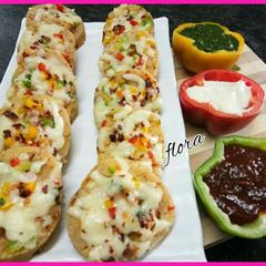 A picture of Cheese masala paneer pizza.