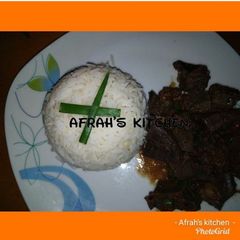 A picture of White rice and liver.