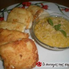 A picture of Feta cheese saganaki with ouzo sauce.