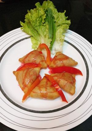 A picture of Mini Pizza Sweet Samosa.