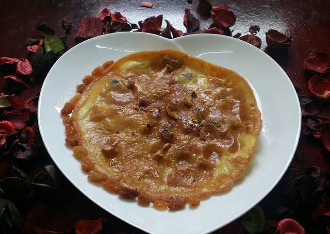 Shomlette (Omelette with sugar and dry fruits)..