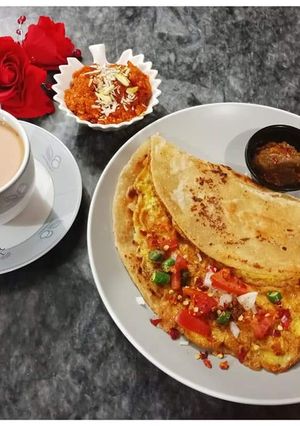 A picture of Lachaydar Spicy Anda Paratha With Gajar Ka Halwa.