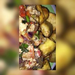 A picture of Fried sweet potatoes with egg sauce.