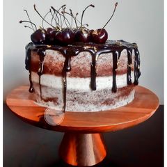 Dark Chocolate Drip cake with Cream cheese and Cherry Jam A picture of Dark Chocolate Drip cake with Cream cheese and Cherry Jam.
