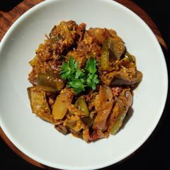 A picture of Onion 🧅 Eggplant 🍆 with Curd.