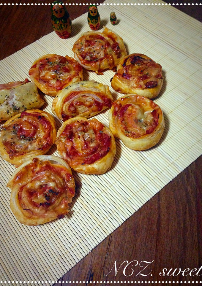 Una foto de Rollitos de hojaldre salados 🌀🍴
