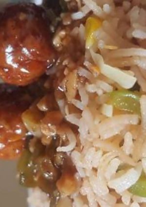 A picture of Fried rice and manchurian.