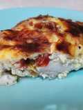 Pechuga de pollo al horno con leche evaporada, tomate y queso