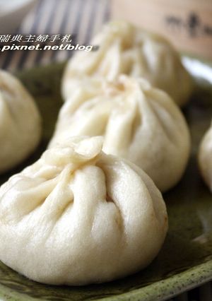 A picture of Kid-Friendly Xiao Long Bao (Steamed Soup Dumplings with Yeast Dough).