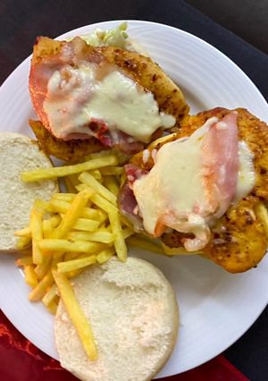 A picture of Delicious Chicken and bacon burgers made by hubby!.