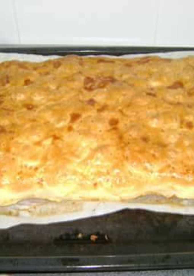 Una foto de Empanada de queso y beicon