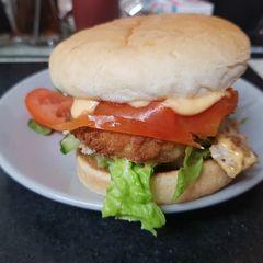 A picture of My lovely Cod in batter burger bun with tangy seafood sauce 😘.