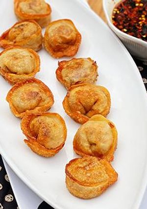 A picture of Korean Kimchi Mandu (Dumplings) with Wagyu Beef.