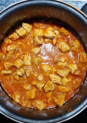 Una foto de Carne de cerdo con tomate