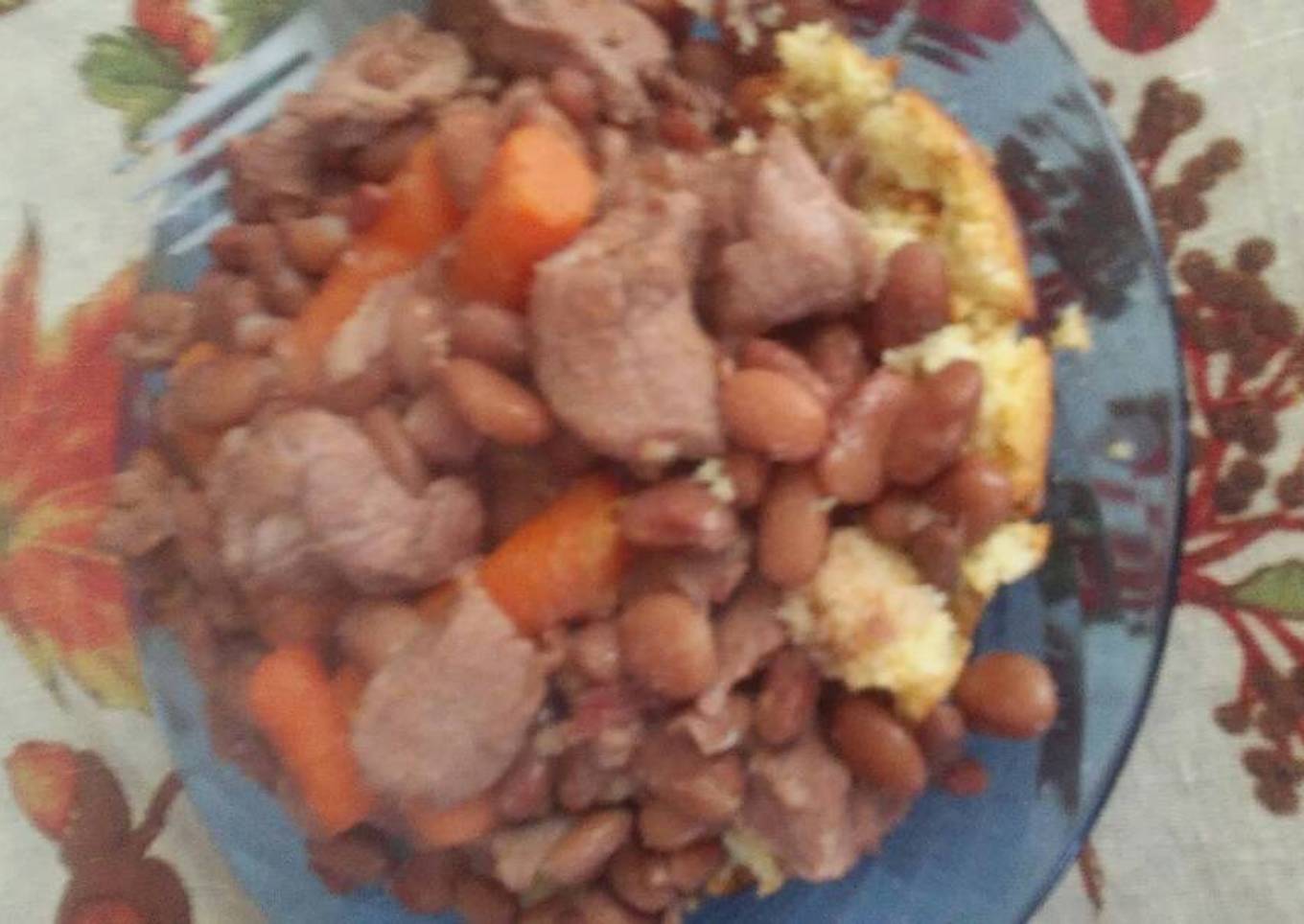 Pinto beans with pork over cornbread