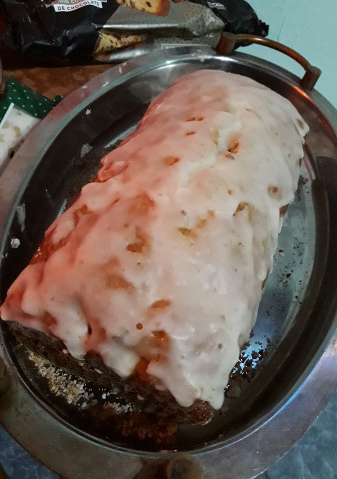 Una foto de Budín de frutos secos glaseado