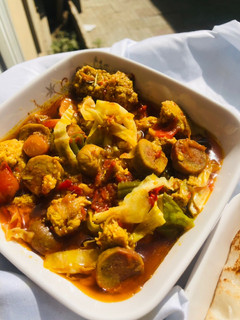 A picture of Sausage and veggies sauce.