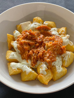Una foto de Papas bravas