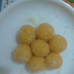 A picture of Mango coconut ladoo.