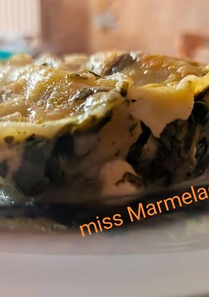 A picture of Cannelloni with Spinach and Cheese Sauce.