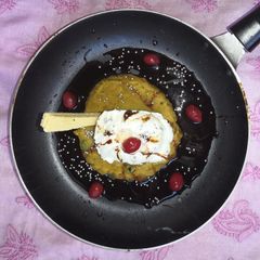 A picture of Puran-Icecream in chocolate sauce.