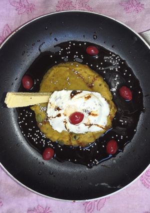 A picture of Puran-Icecream in chocolate sauce.